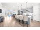 Modern kitchen features a large island, stainless steel appliances, and an open layout at 3239 Bartee Walk, Suwanee, GA 30024