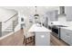 Spacious kitchen with a large island, stainless steel appliances, and ample counter space at 3239 Bartee Walk, Suwanee, GA 30024