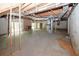 Spacious unfinished basement with concrete floor and exposed ceiling, ready to be transformed at 110 Vistacrest Way, Roswell, GA 30075