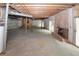 Large unfinished basement provides ample space with a fireplace and exposed ceiling at 110 Vistacrest Way, Roswell, GA 30075