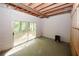 Unfinished basement with sliding glass doors to yard and space for future expansion at 110 Vistacrest Way, Roswell, GA 30075
