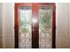 Elegant wood double doors with leaded glass inserts at 110 Vistacrest Way, Roswell, GA 30075