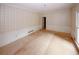 Living room features traditional wallpaper, baseboard trim, and a window at 110 Vistacrest Way, Roswell, GA 30075