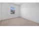Cozy bedroom with neutral carpet, one window, and natural light. Ample space for furniture at 244 Church St, Lawrenceville, GA 30046