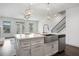 Modern kitchen with a large island, stainless steel sink, and stainless steel appliances at 244 Church St, Lawrenceville, GA 30046