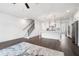 Spacious living area with hardwood floors that flows into the modern kitchen, offering an open and inviting atmosphere at 244 Church St, Lawrenceville, GA 30046