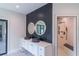 Modern bathroom with double vanity, backlit mirrors, and walk-in shower at 2740 Drew Valley Ne Rd, Brookhaven, GA 30319