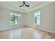 Bright bedroom with hardwood floors and large windows that offer an abundance of natural light at 2740 Drew Valley Ne Rd, Brookhaven, GA 30319