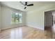Comfortable bedroom with a ceiling fan and ample natural light at 2740 Drew Valley Ne Rd, Brookhaven, GA 30319