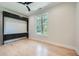 Spacious bedroom with built-in storage and a large window providing natural light at 2740 Drew Valley Ne Rd, Brookhaven, GA 30319
