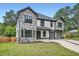 Well-maintained two-story home with stone accents, two-car garage, and established landscaping at 2740 Drew Valley Ne Rd, Brookhaven, GA 30319