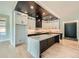 Modern kitchen features an island, stainless steel appliances, and ample cabinet space at 2740 Drew Valley Ne Rd, Brookhaven, GA 30319