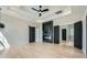 Spacious main bedroom with a coffered ceiling and a modern fireplace at 2740 Drew Valley Ne Rd, Brookhaven, GA 30319