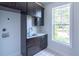 Mud room with stainless steel sink and built-in cabinetry at 2740 Drew Valley Ne Rd, Brookhaven, GA 30319