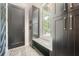 Stylish mudroom with custom built-in cabinets, bench seating and large windows at 2740 Drew Valley Ne Rd, Brookhaven, GA 30319