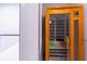 Home sauna with glass door and wooden bench providing a relaxing and therapeutic experience at home at 2740 Drew Valley Ne Rd, Brookhaven, GA 30319