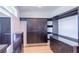 Spacious walk-in closet with custom cabinetry and ample storage space at 2740 Drew Valley Ne Rd, Brookhaven, GA 30319