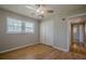 Bedroom with hardwood floors, window, and closet space at 3710 A B Lynn Dr, Powder Springs, GA 30127