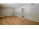 Living room with hardwood floors, painted walls and doorway at 3710 A B Lynn Dr, Powder Springs, GA 30127