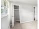 Bedroom with a closet and light from a large window at 7248 Banks Mill Rd, Douglasville, GA 30135