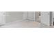 Spacious basement with fresh paint, multiple doors, and bright trimwork throughout at 18 Black Gum Ln # 53, Auburn, GA 30011