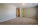 Bright bedroom with carpet flooring with an ensuite bathroom for added convenience at 606 Windcroft Nw Cir, Acworth, GA 30101