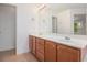 Bathroom with a double vanity and tile flooring at 7454 Silver Arrow Se Trl, Austell, GA 30168
