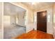 Inviting foyer with hardwood floors and views of the living and dining rooms at 12080 Mountain Laurel Dr, Roswell, GA 30075