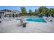 Community pool with lounge chairs and diving board at 12080 Mountain Laurel Dr, Roswell, GA 30075