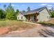 Charming exterior featuring a covered porch and a swing at 130 Williams Rd, Villa Rica, GA 30180