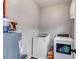 Laundry room with washer, dryer, and water heater at 130 Williams Rd, Villa Rica, GA 30180