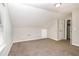 Neutral bedroom features plush carpet and an abundance of natural light at 155 Oak Terrace Dr, Covington, GA 30016