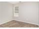 Bedroom featuring neutral walls, carpeted flooring, and a window at 155 Oak Terrace Dr, Covington, GA 30016