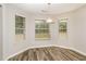 Bright breakfast nook with natural light streaming through three windows at 155 Oak Terrace Dr, Covington, GA 30016