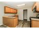Kitchen with wood cabinets and stainless steel appliances at 155 Oak Terrace Dr, Covington, GA 30016