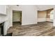 Open-concept floor plan connecting the living room, kitchen and dining area at 155 Oak Terrace Dr, Covington, GA 30016