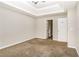 Spacious main bedroom features neutral walls and carpet, and two doors at 155 Oak Terrace Dr, Covington, GA 30016