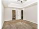 Spacious main bedroom features neutral walls and carpet, and two doors at 155 Oak Terrace Dr, Covington, GA 30016