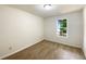 Cozy bedroom with carpeted floors and a sunny window at 2012 Elm Grove Ln, Hampton, GA 30228
