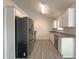 This kitchen features modern appliances, countertops, and stylish cabinets for a sleek design at 2012 Elm Grove Ln, Hampton, GA 30228