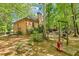 Lush backyard with a swing set and established landscaping, offering a tranquil outdoor setting at 318 Dogwood Trce, Mcdonough, GA 30252