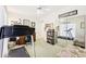Multipurpose bedroom with an office space, a treadmill and large mirror at 318 Dogwood Trce, Mcdonough, GA 30252