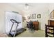 Bright office space featuring a treadmill, desk, and lots of natural light at 318 Dogwood Trce, Mcdonough, GA 30252
