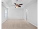 Spacious bedroom with a ceiling fan and natural light from a large window at 3315 Brookfield Dr, Austell, GA 30106