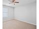 Bedroom with plush carpet, a window, and a ceiling fan at 3315 Brookfield Dr, Austell, GA 30106