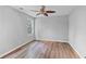 Bedroom with hardwood floors, neutral walls, and natural light at 3315 Brookfield Dr, Austell, GA 30106
