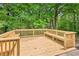 Beautiful wooden deck surrounded by lush greenery, perfect for outdoor relaxation at 3315 Brookfield Dr, Austell, GA 30106