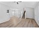 Open-concept living room featuring soaring ceilings and hardwood floors at 3315 Brookfield Dr, Austell, GA 30106