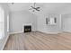 Bright living room with vaulted ceilings, fireplace, and hardwood floors at 3315 Brookfield Dr, Austell, GA 30106
