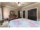Comfortable bedroom with ceiling fan, ensuite, and closet at 4190 Madison Dr, Cumming, GA 30040